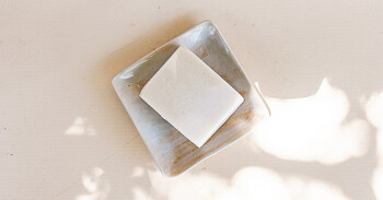 Photo by Sincerely Media on Unsplash Bar of soap