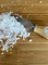 Magnesium flakes on a chopping board