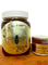 Medical grade honey in bottles and tubs on wooden tubs