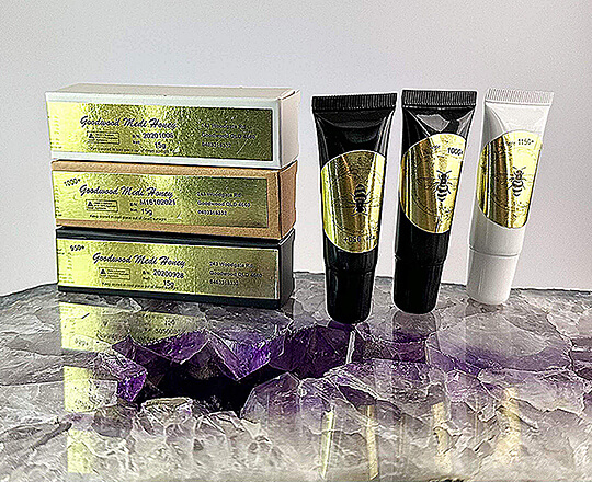 3 grades of MGO honey displayed on a nice crystal table