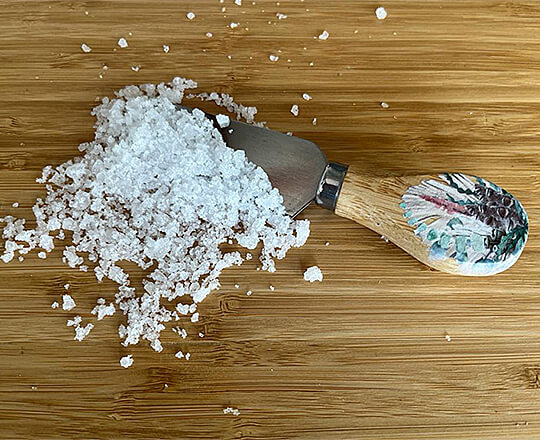 Magnesium flakes on a chopping board